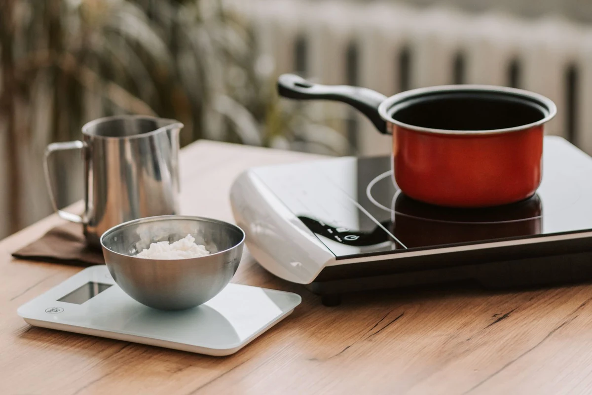 A cooking pot on a portable induction hob