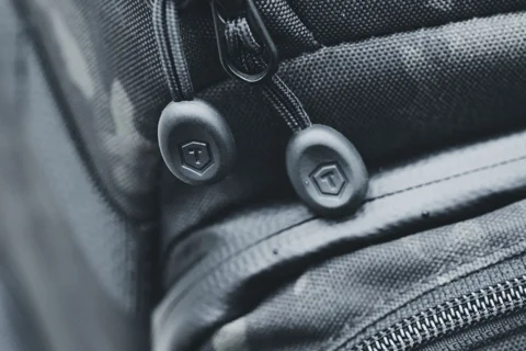 A close view of a backpack zip
