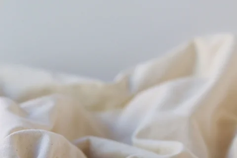 Close view of white woven cotton fabric