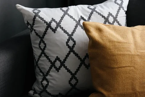 Different cushion covers arranged on a sofa