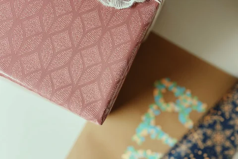 A small wrapped gift with ribbon