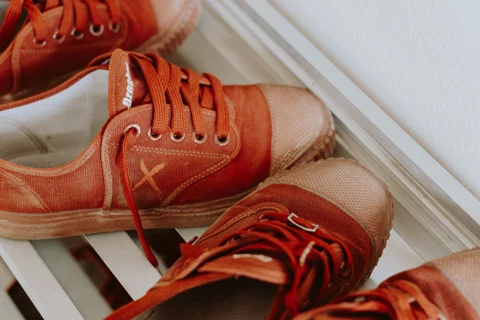 Shoes arranged on a household shoe rack